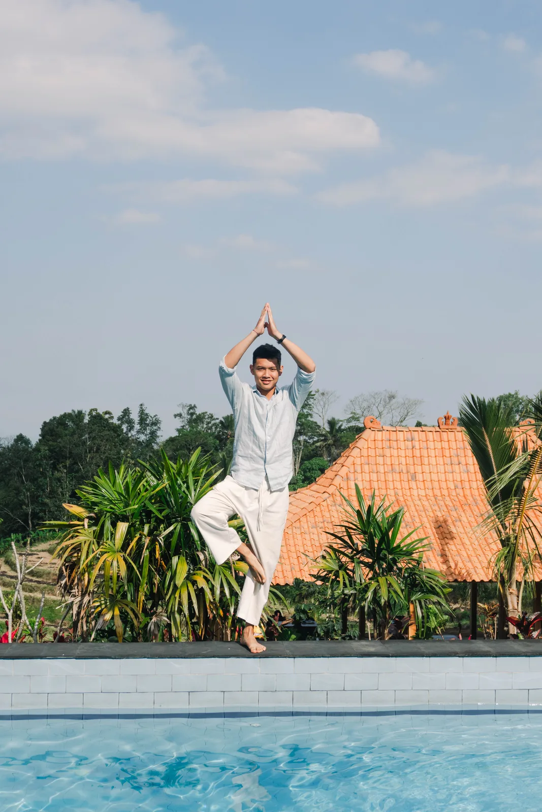 Morning yoga by the pool